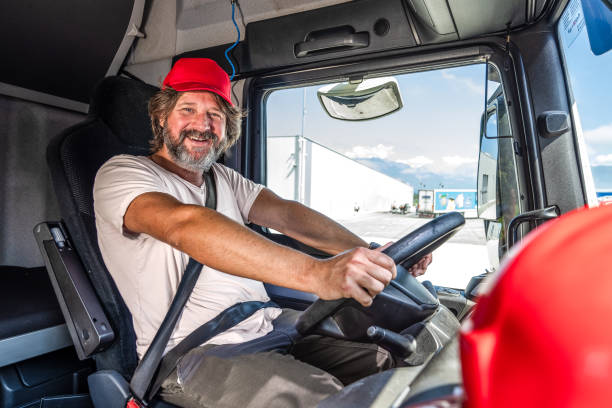 istock Smiling truck driver looking at camera 1549127803