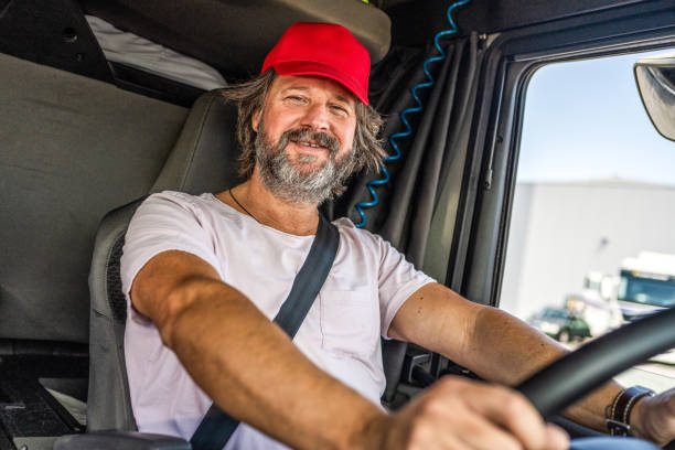 istock Smiling truck driver looking at camera 1549127806