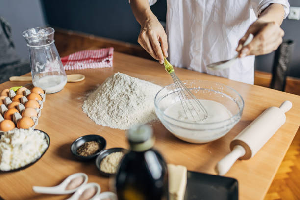 istock A young woman preparing dough 1549149938
