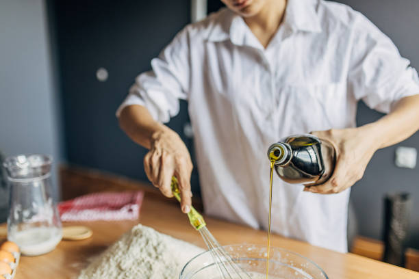 istock A young woman preparing dough 1549150467