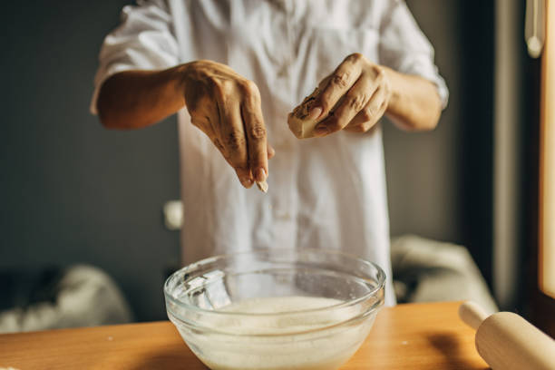 istock A young woman preparing dough 1549150985