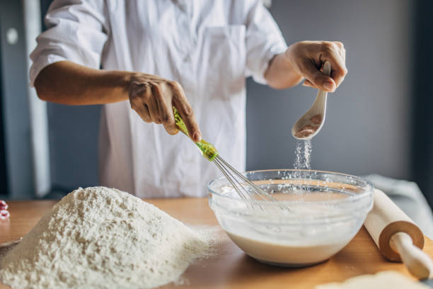 istock A young woman preparing dough 1549153812