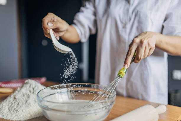 istock A young woman preparing dough 1549155764