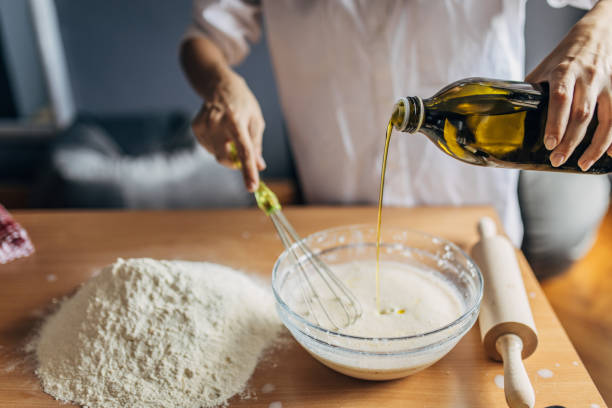 istock A young woman preparing dough 1549157921