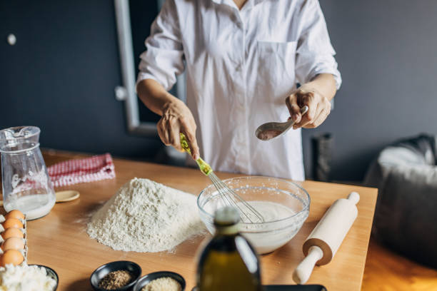 istock A young woman preparing dough 1549162076