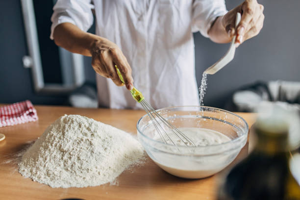 istock A young woman preparing dough 1549162605