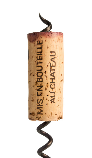 A French red wine cork, carrying the phrase \
