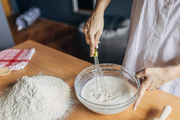 istock Woman preparing dough 1549173554
