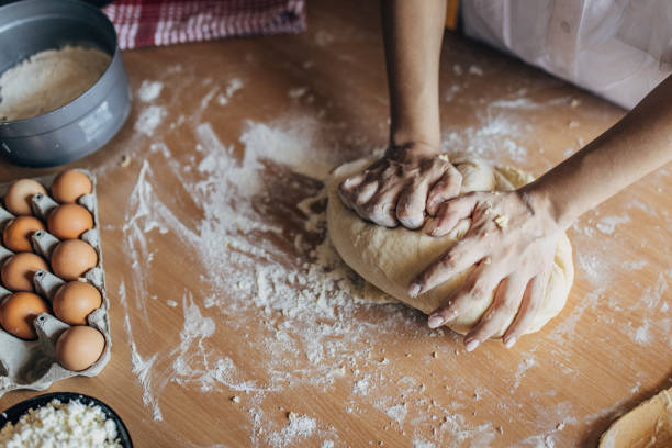 istock Woman preparing dough 1549174600