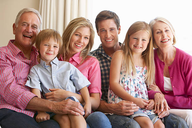 istock Three Generation Family Relaxing On Sofa At Home 154917701