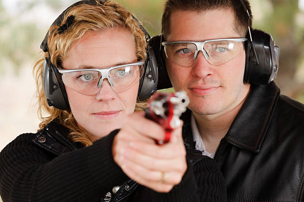 istock Man and Woman at the Shooting Range 154917764