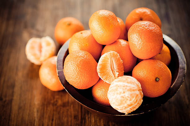clementines - peeled orange fruit tangerine 뉴스 사진 이미지