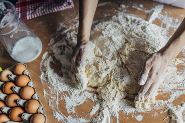 istock Woman preparing dough 1549181401