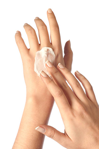 istock Female hands applying hand cream 154918198