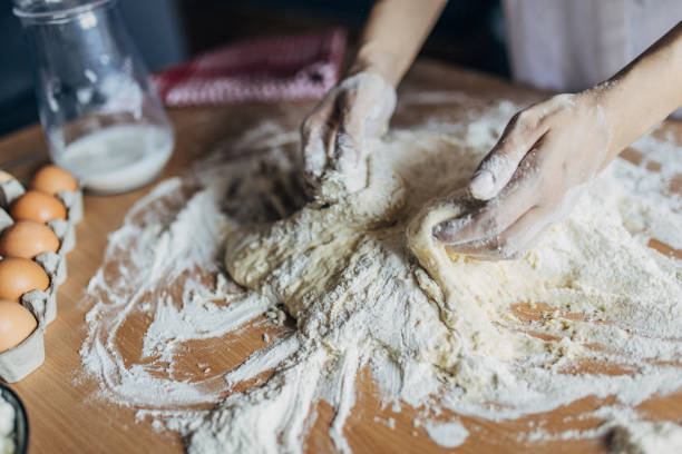 istock Woman preparing dough 1549182411