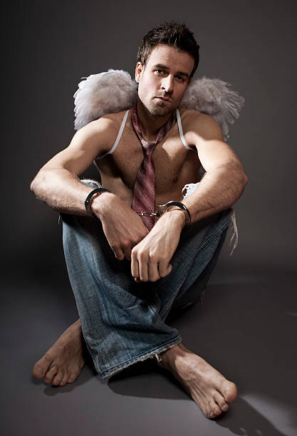 istock Sad angel with handcuffs 154918249