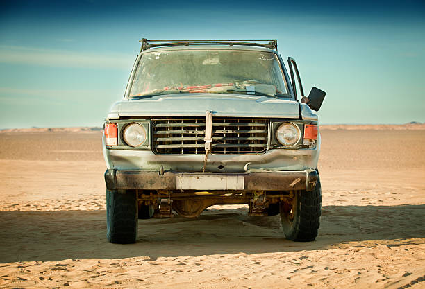 Run down 4x4 in Libyan desert stock photo
