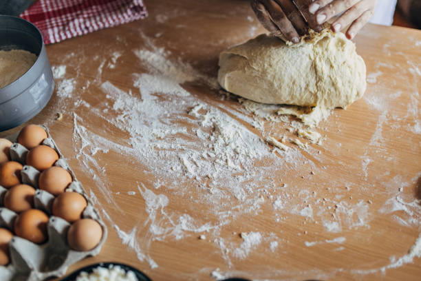 istock Woman preparing dough 1549183943
