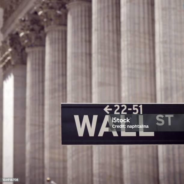 Wall Street Sign And Columns Stock Photo - Download Image Now - New York Stock Exchange, Wall Street - Lower Manhattan, Architectural Column