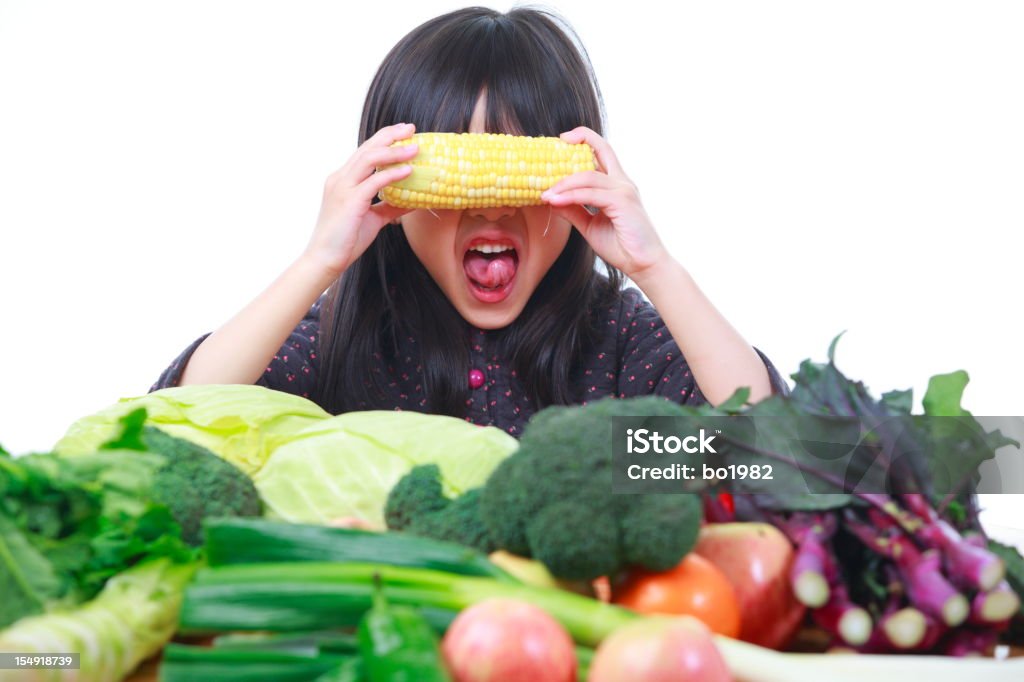 Bella ragazza con verdure - Foto stock royalty-free di 6-7 anni