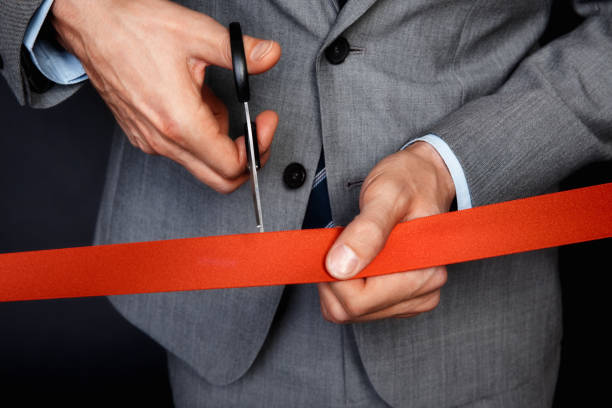 istock Businessman cutting ribbon 154918821