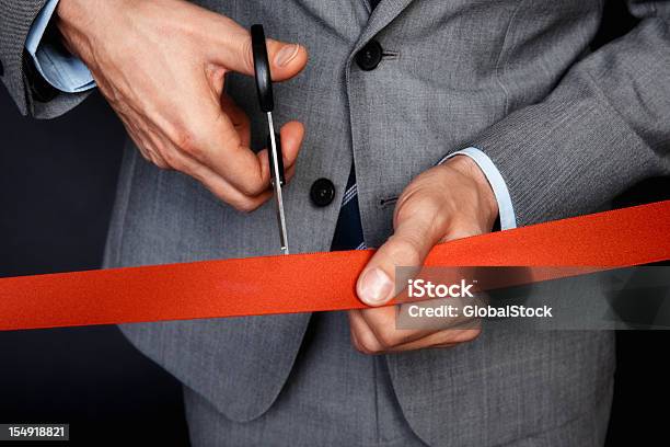 Businessman Cutting Ribbon Stock Photo - Download Image Now - Administrator, Adult, Adults Only