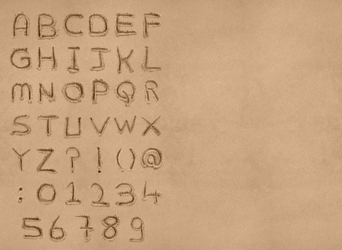 Arena alfabeto con trazado de recorte photo
