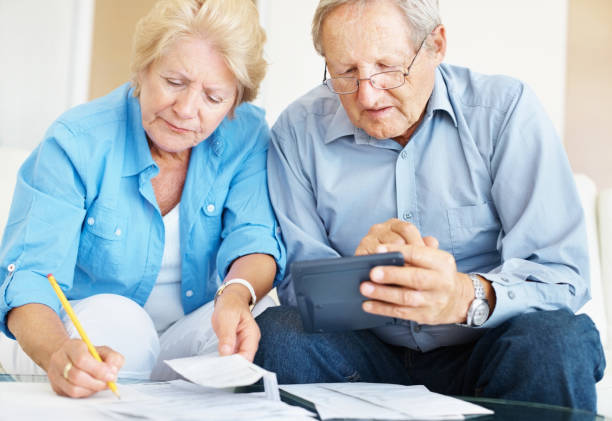 istock Calculating finances at home 154918901