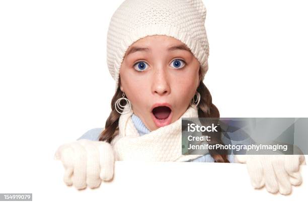 Winter Girl With A Blank Sign Stock Photo - Download Image Now - 10-11 Years, Blank Sign, Blue