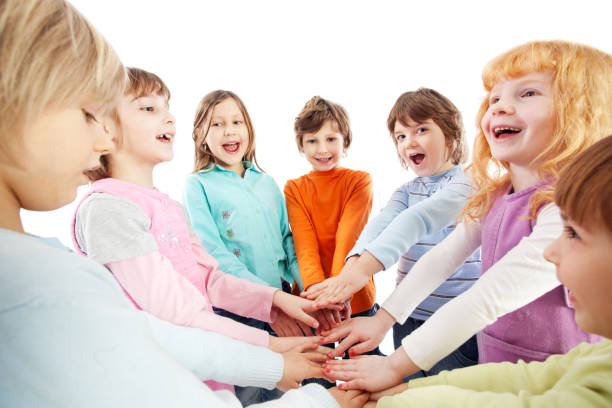 istock Cheerful kids are holding their hands together. 154919191