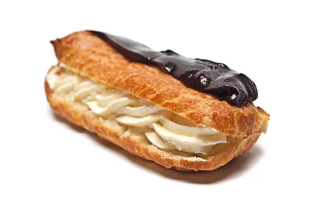 Photo of Tasty Chocolate eclair isolated on a white background