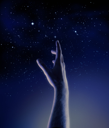 male hand reaching for the stars