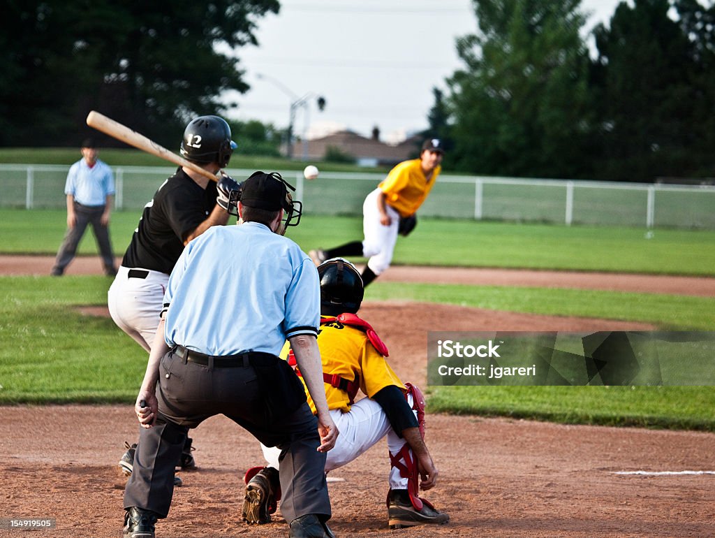 Live in game baseball action  Athlete Stock Photo
