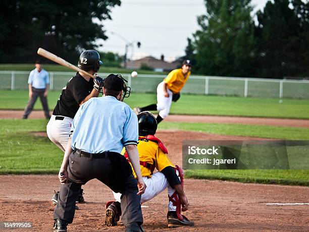 Live In Game Baseball Action Stock Photo - Download Image Now - Athlete, Outfield, Base - Sports Equipment