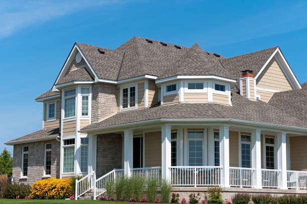 istock White Porch on Large New House 154919513