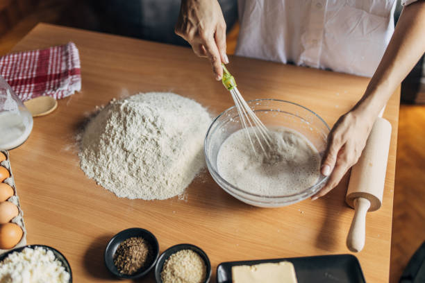 istock Woman preparing dough 1549197388