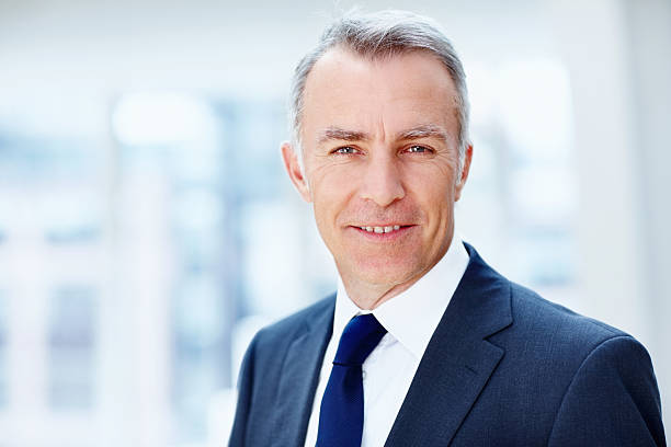 istock Happy senior executive indoors 154919761