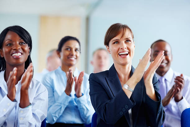 istock Group of colleagues applauding 154919785