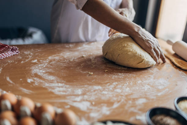 istock Woman preparing dough 1549203662