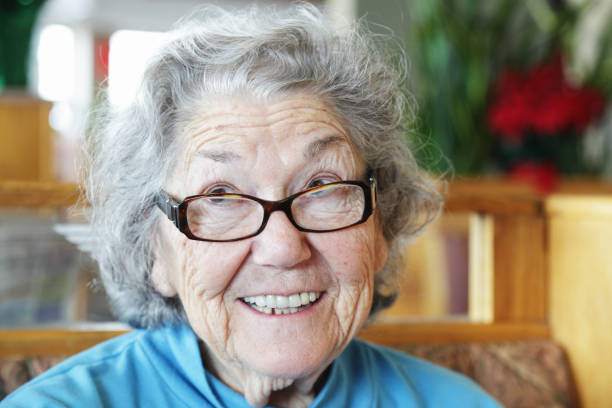 istock Senior Woman Funny Face Looking Up and Smiling 154920401