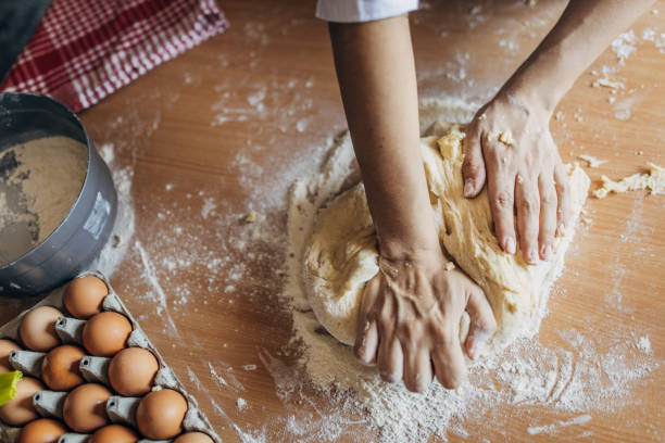 Woman preparing dough