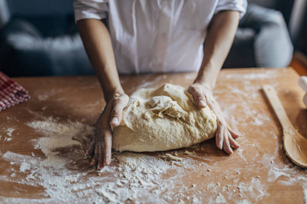 istock Woman preparing dough 1549216603