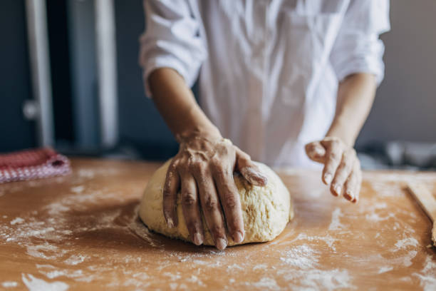istock Woman preparing dough 1549218701