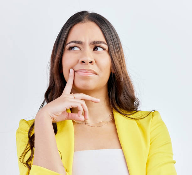istock Thinking, business problem or woman face confused for solution, strategy planning or studio development ideas. Doubt, why or corporate person think of decision, question or choice on white background 1549219393