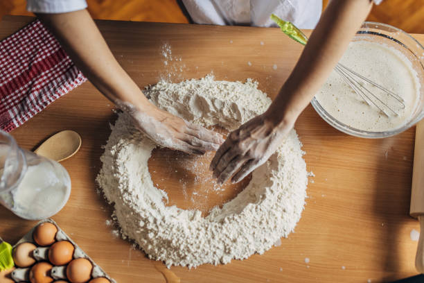 istock Woman preparing dough 1549220273