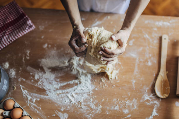 istock Woman preparing dough 1549222320