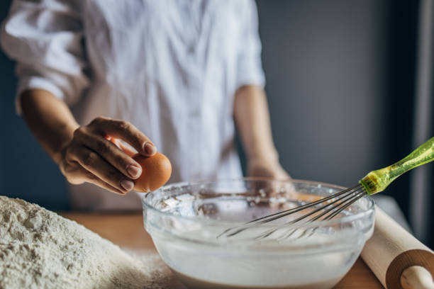 istock Woman preparing dough 1549223866