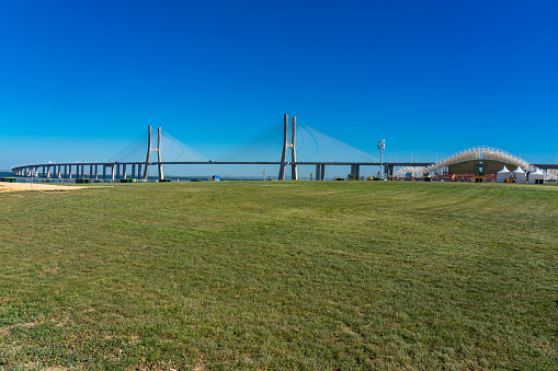 Main stage for the World Youth Days in the final stages of construction in front of the Vasco da Gama Bridge in Parque Tejo, whith Vasco da Gama bridge. Image captured on July 14, two weeks before the start of the event.