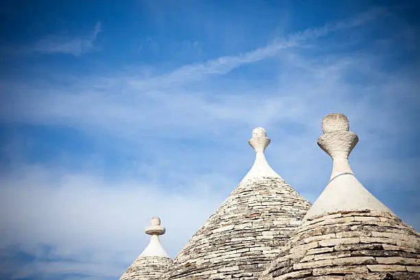 Trulli roofs against a blue sky. Alberobello (Bari, Apulia - Italy).