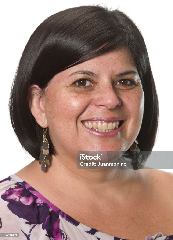 Foto de un sonriente mujer hispana sobre un fondo blanco. - Foto de stock de 30-39 años libre de derechos